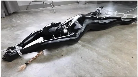 Rubber-bound Girl In Electro Play