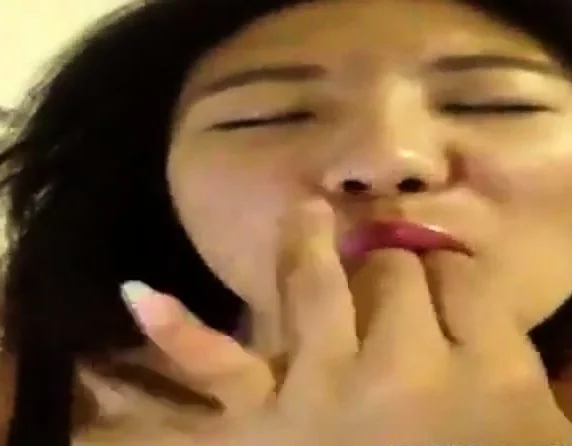 Freaky Asian girl pleasuring herself - selfie