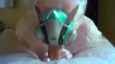 Woman In A Gas Mask And Gloves Jerks Off A Cock And Sucks. H