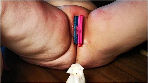 Labia And Clit With Candle, Clips And Brush