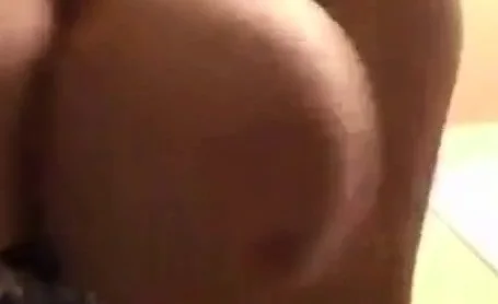 Boobs spill out of corset