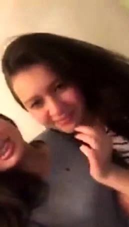 Girls kiss in webcam
