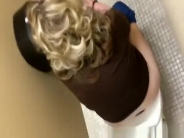strokes cock while woman peeing