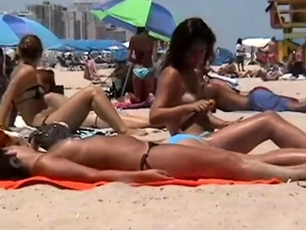 Morning beach nudity caught on by beach hidden cam