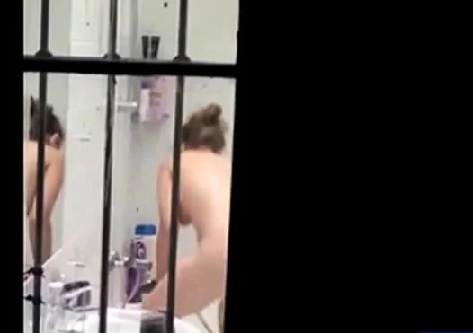 Neighbour caught naked in bathroom
