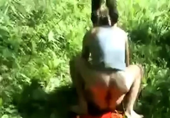 Mature girl fucks young male in the forest