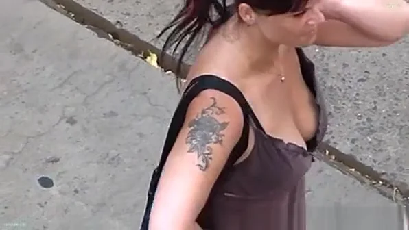 Woman with big breasts, large neckline.