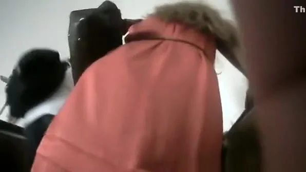 Upskirt on metro rolling stairs