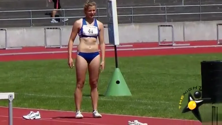 Scantily clad long jumper has a nice ass