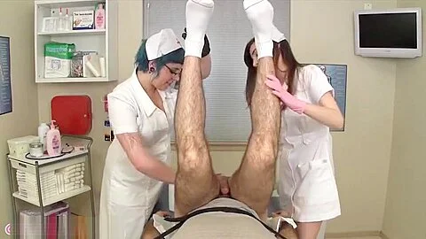 Gloved nurses diaper change