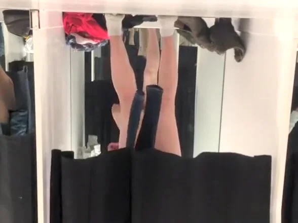 Girl in pink panties trying new clothes
