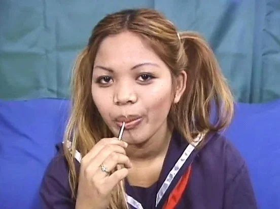 An Oriental cutie thinks she can handle this really long pole