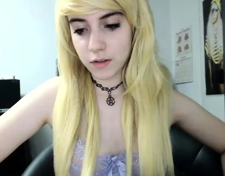 Blonde teen in solo action with her pussy