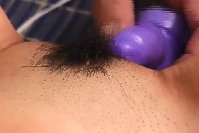 Petite Oriental beauty gets her tight hairy cunt pleased with sex toys