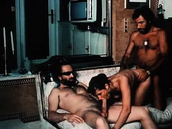 Classic porn with two ladies of the evening coming over to please them
