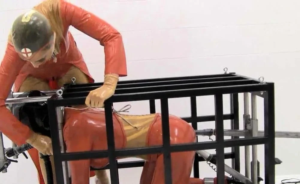 Busty blonde in latex fucked during a bdsm session