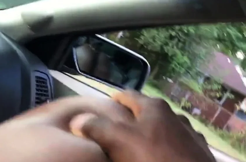Black slut sucking dick in front seat of car