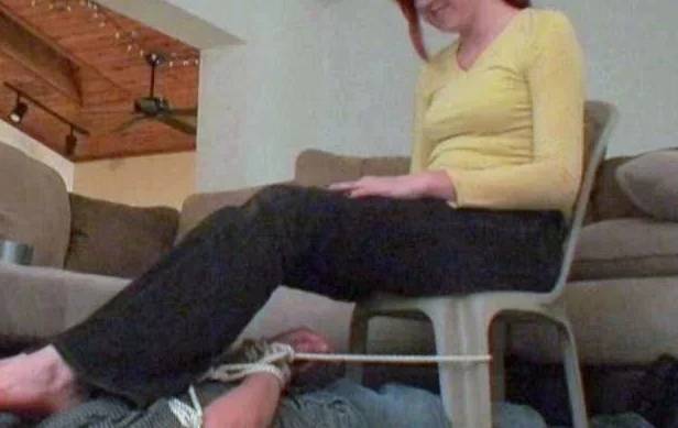 Light femdom and foot fetish play with brunette