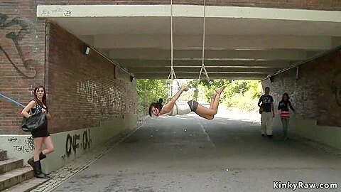 Gagged Slut Suspended From A Bridge