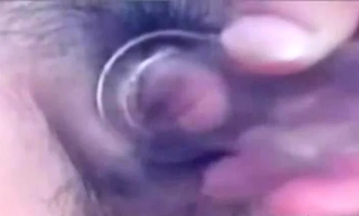 a woman pumps her clit into a dick