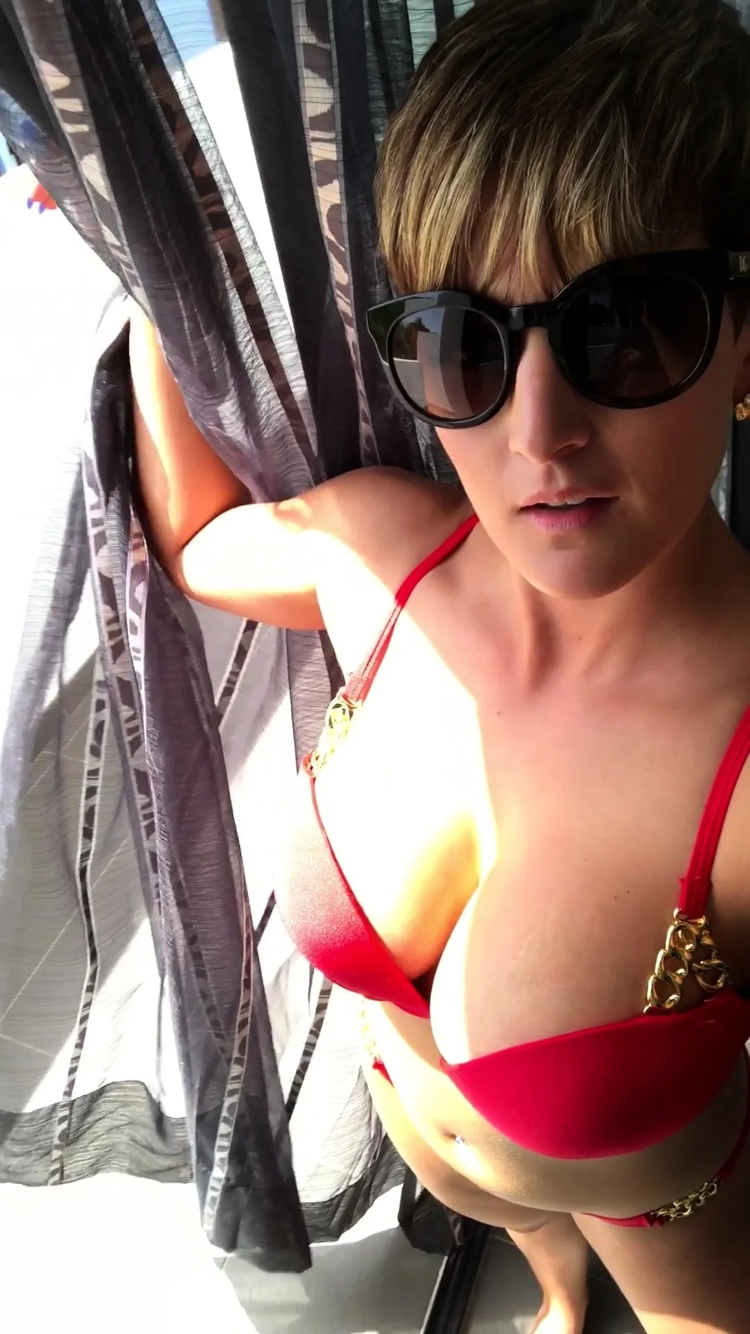 Busty curly brunette with big boobs fucks on couch
