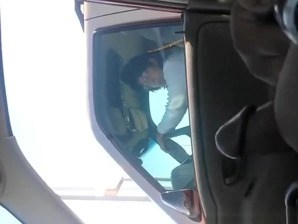 Guy playing with his cock in traffic