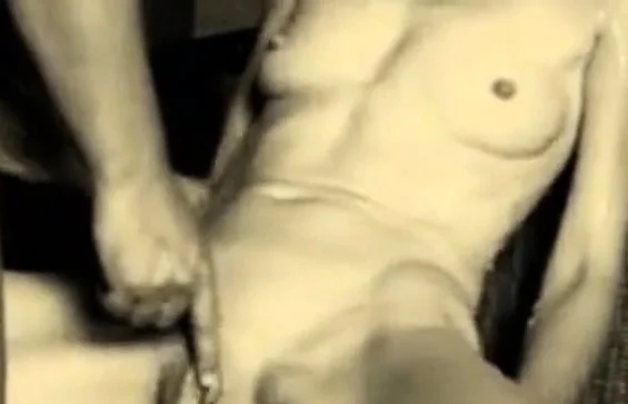 Fingering her huge labia while cumming all over her body
