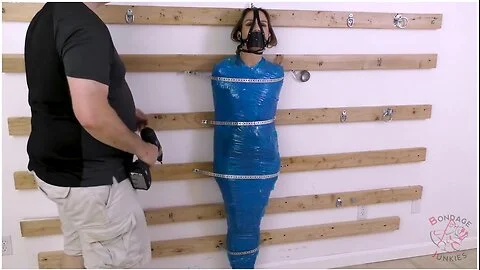 Madison Muzzled, Mummified, And Strapped Wo The Wall!