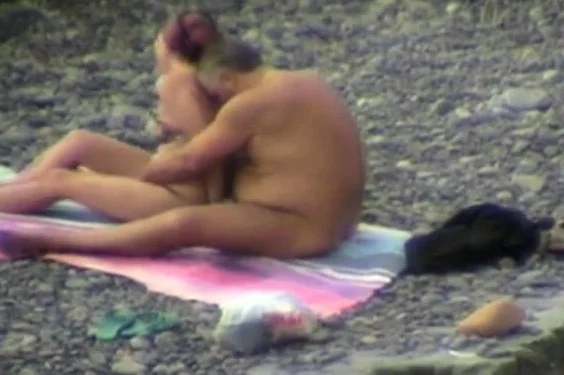 Groping on the beach