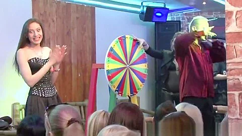 The wheel decides which guy she has to fuck