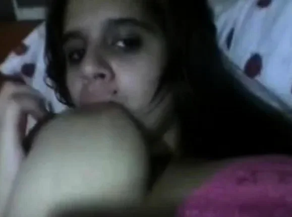 licking her big boobs