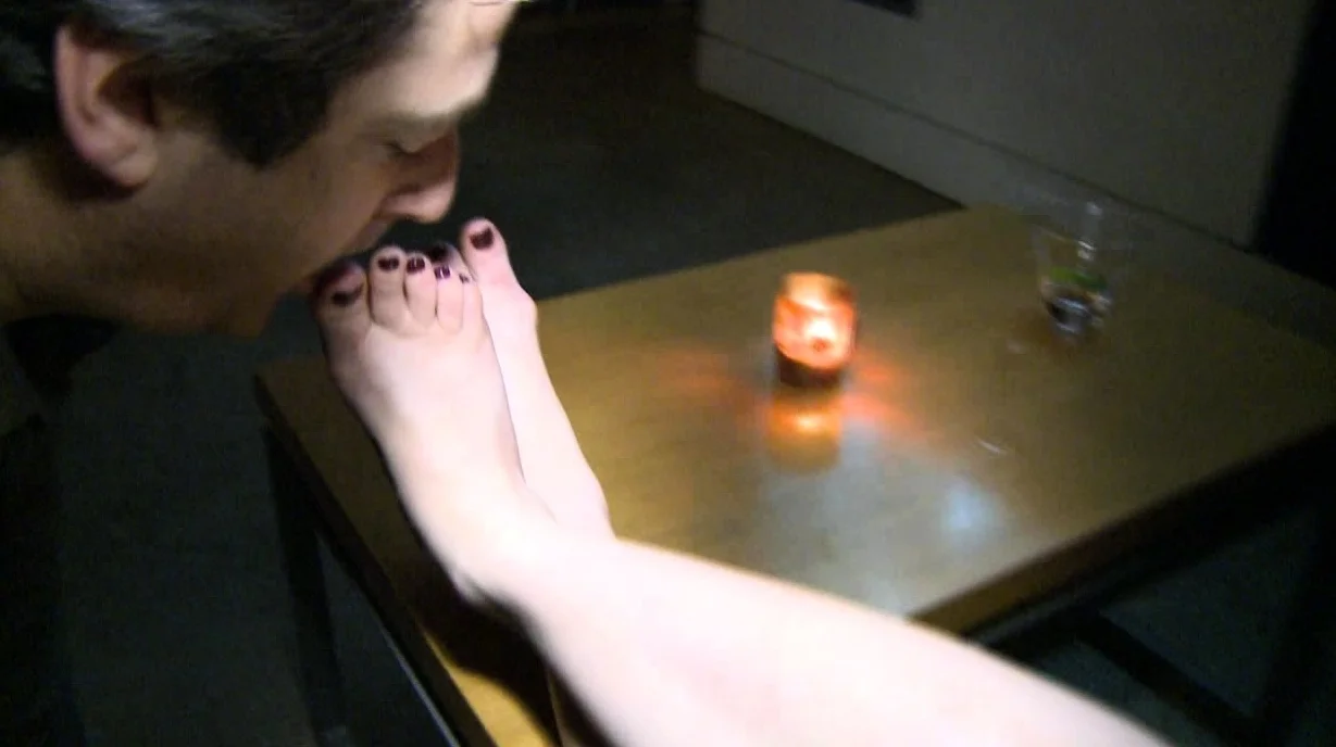 Light femdom and foot fetish play with brunette
