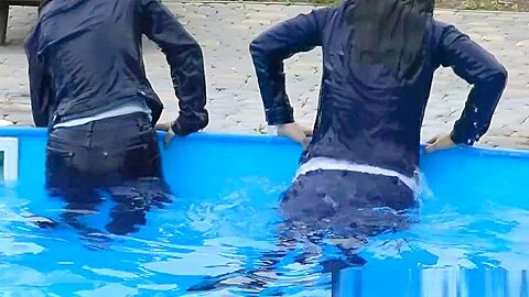 Anna and Eva take bath in a pool and in a jacuzzi in tight blue jeans