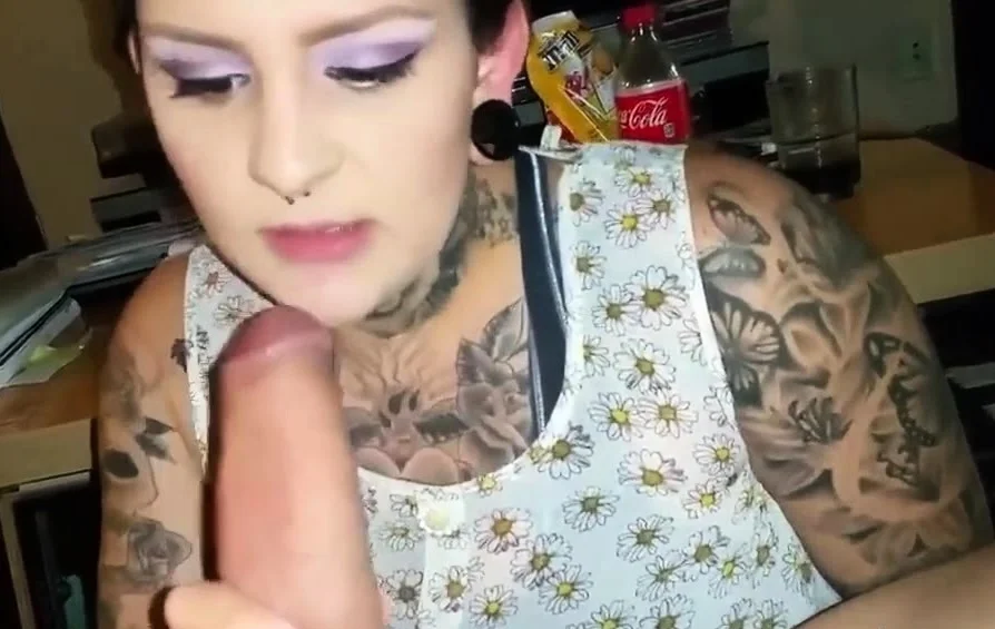 tattooed girl sucks cock