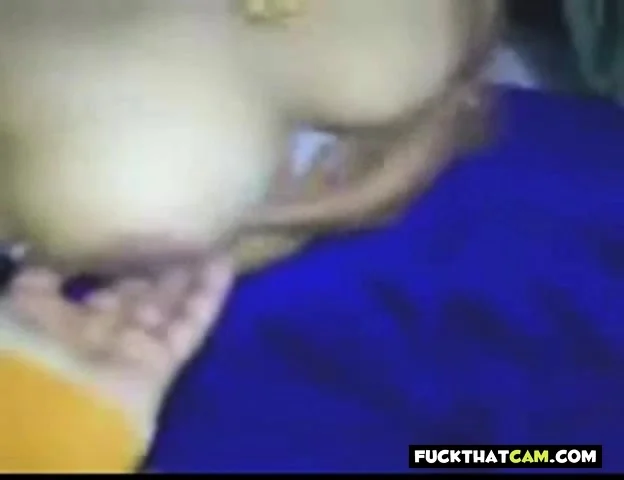 Sexy Indian MILF shows her big natural hooters on cam