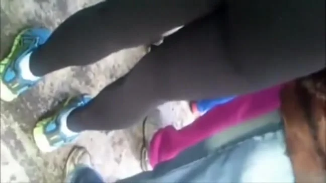Jerking the cock right behind her