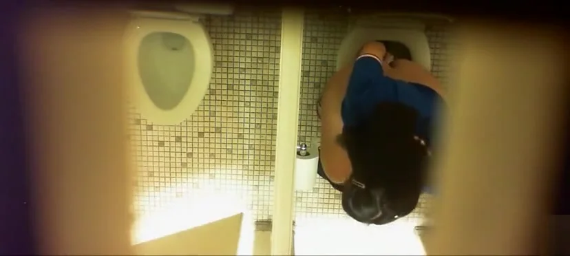 Females get filmed while urinating in the ladies room