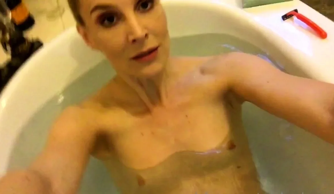 Busty amateur milf masturbates in the shower
