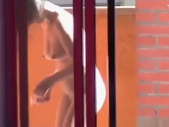 Neighbor spied through window shaving