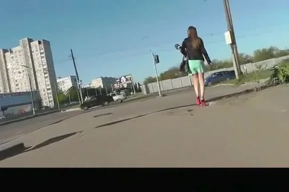 Nice legs chick in short green skirt