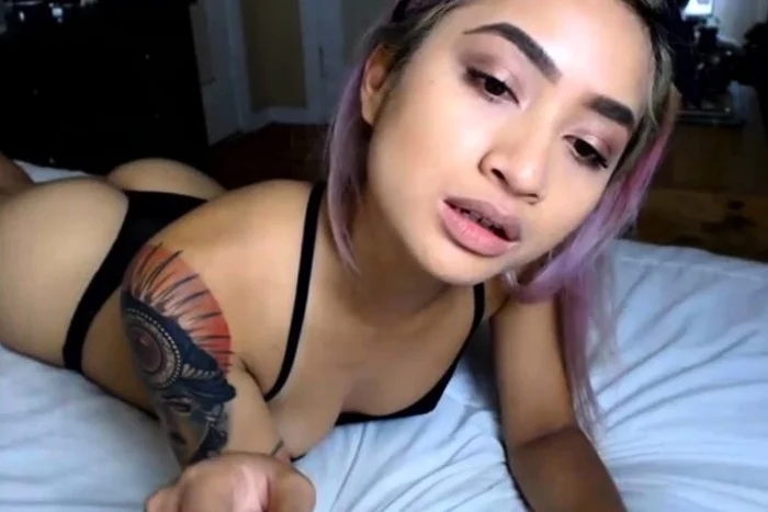 Masturbating in a bra panties and black stockings