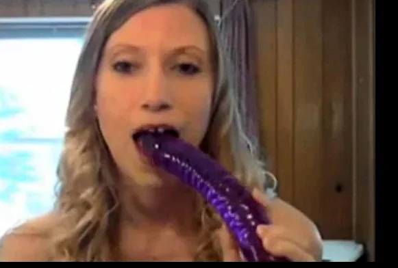 She takes a huge dildo in her ass