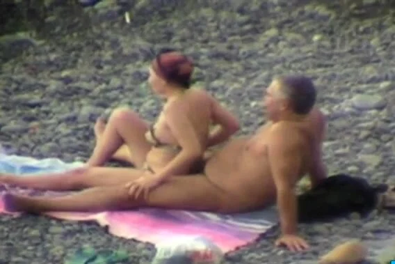 Groping on the beach