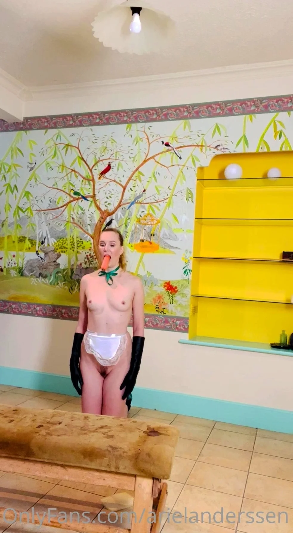 Blonde teen slut plays with a toy banana