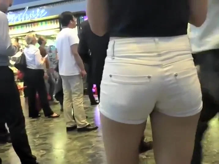 Hot girl is playing on her phone