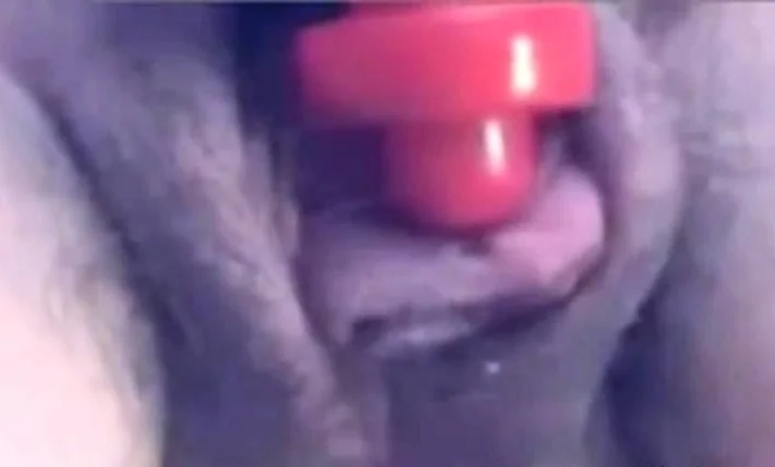 a woman pumps her clit into a dick