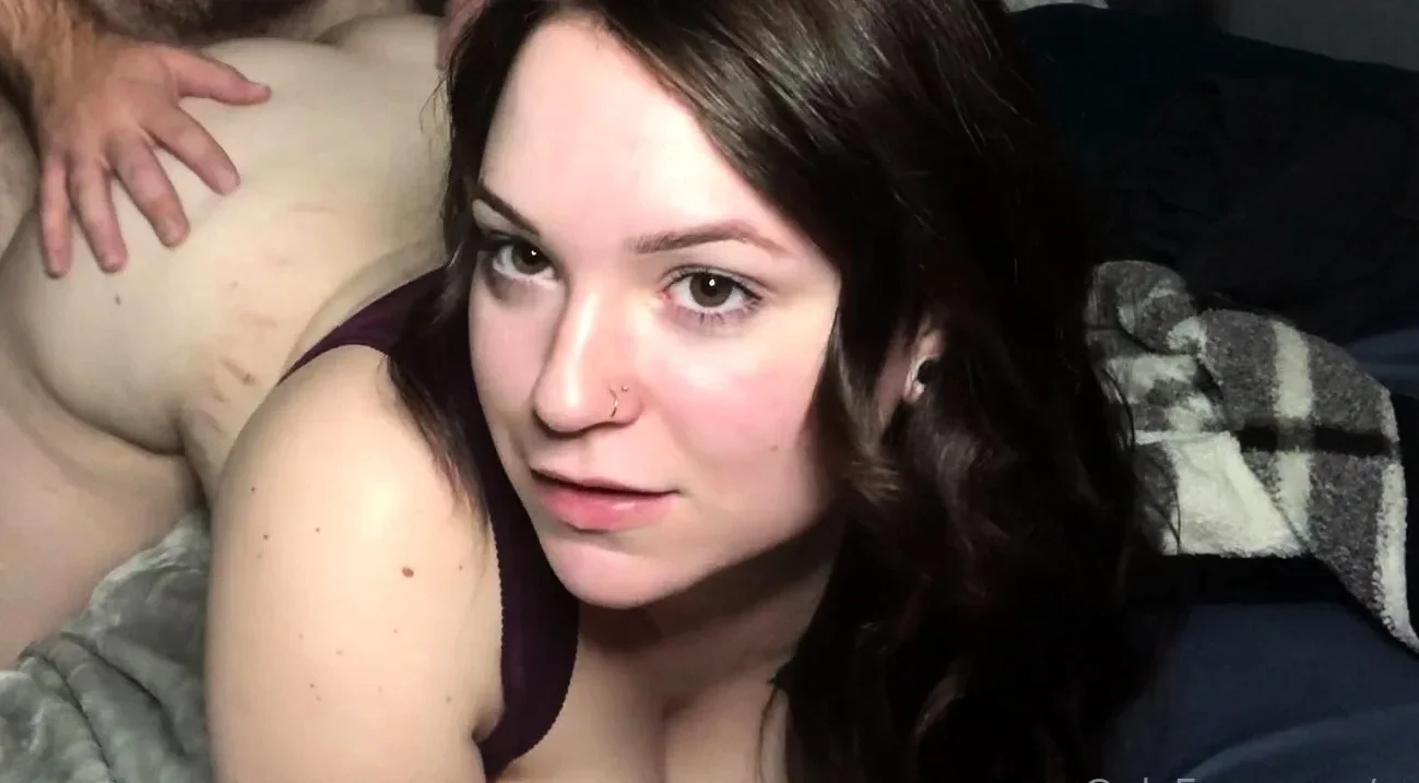 Busty curly brunette with big boobs fucks on couch
