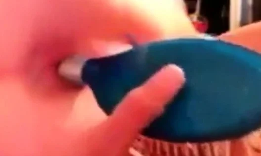 Fucking  her ass with hairbrush