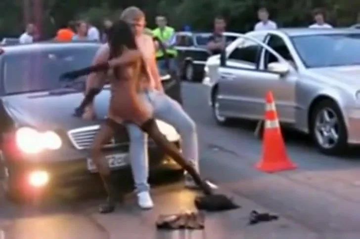 Girl strips and dances on a guy