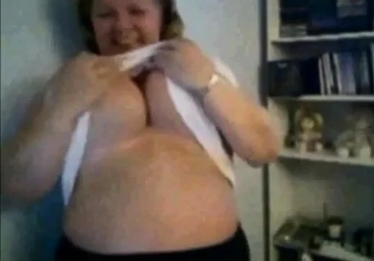 Mature Nancy playing with her boobs on webcam